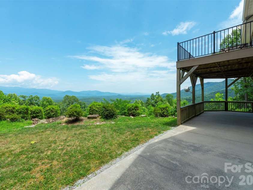 301 Oak Winds Drive, Old Fort, NC 28762.  MLS# CAR4399378, YatesRealty ID 36175. Grassy yard with views