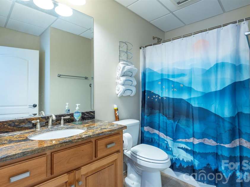 301 Oak Winds Drive, Old Fort, NC 28762.  MLS# CAR4399378, YatesRealty ID 36175. Lower level full bath