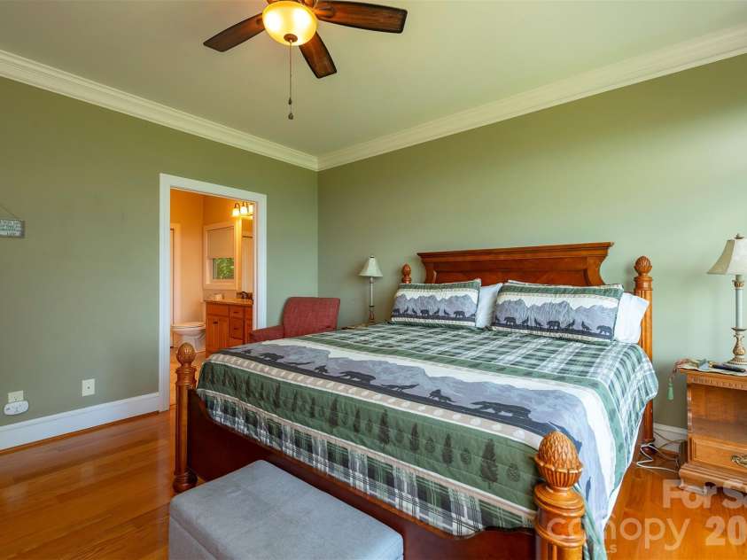301 Oak Winds Drive, Old Fort, NC 28762.  MLS# CAR4399378, YatesRealty ID 36175. Primary bedroom