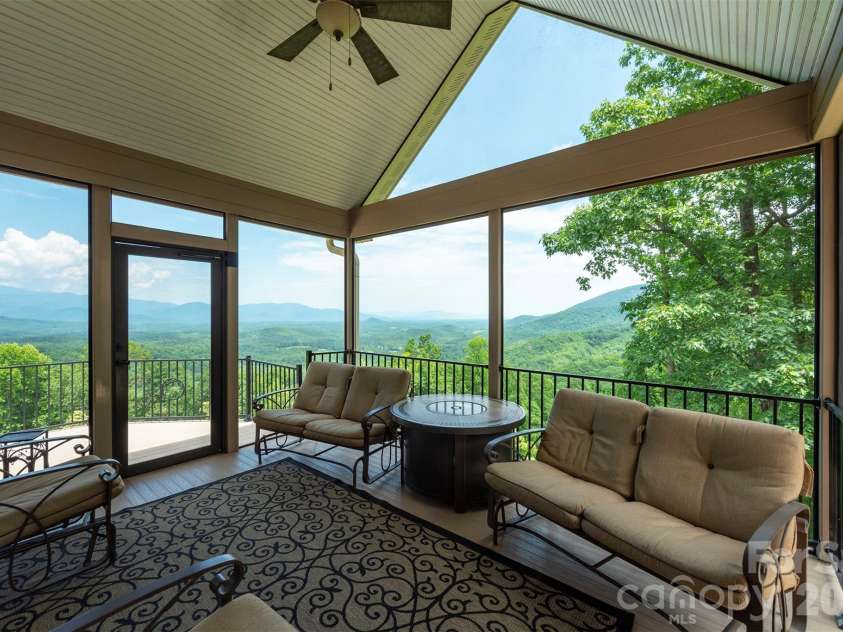 301 Oak Winds Drive, Old Fort, NC 28762.  MLS# CAR4399378, YatesRealty ID 36175. Screen porch