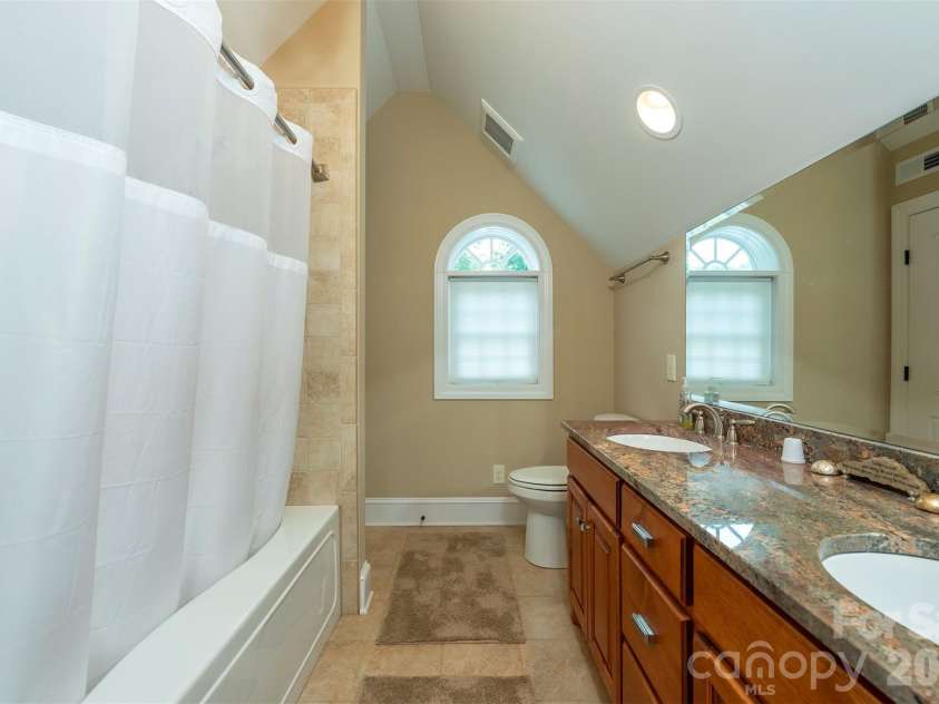 301 Oak Winds Drive, Old Fort, NC 28762.  MLS# CAR4399378, YatesRealty ID 36175. Upstairs bathroom