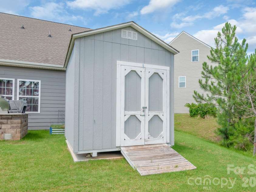 17713 Yarwill Court, Charlotte, NC 28278.  MLS# CAR4400457, YatesRealty ID 36179. Storage shed