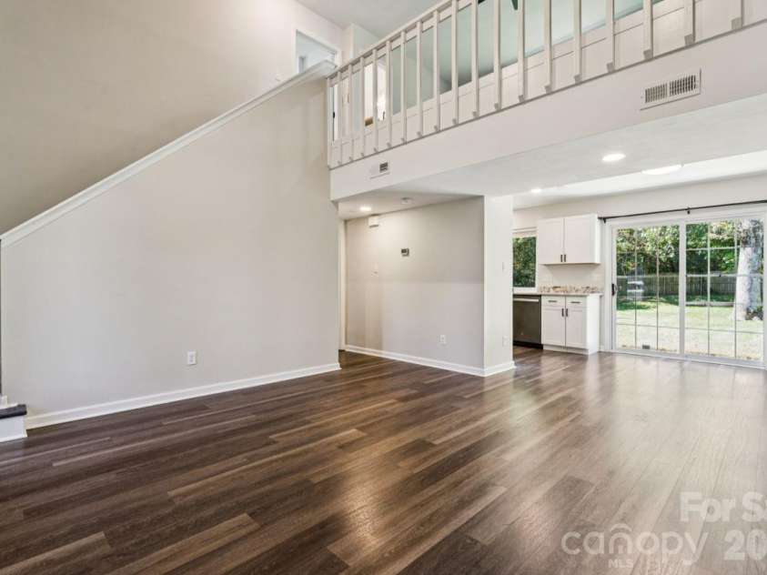 6719 Montezuma Trail, Charlotte, NC 28227.  MLS# CAR4434909, YatesRealty ID 36181. Living room into dining