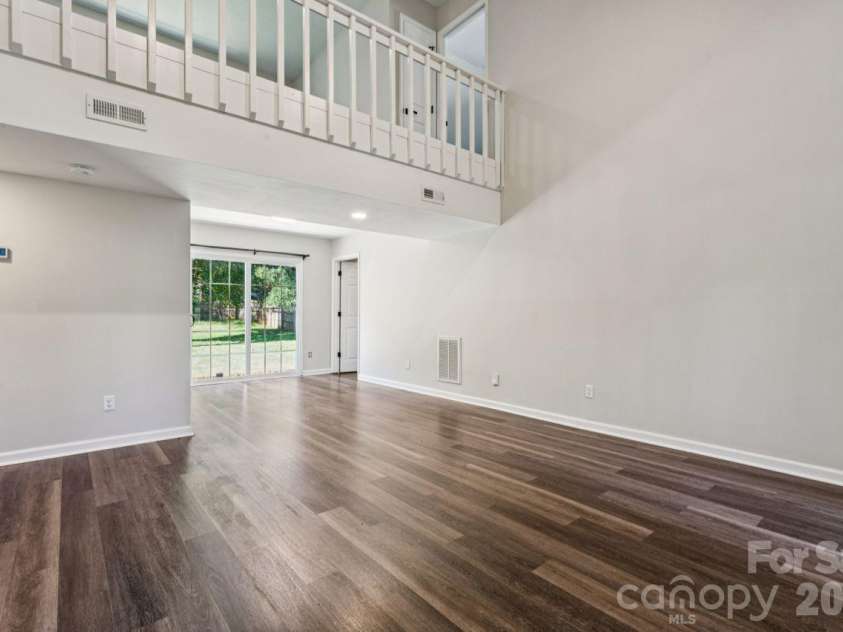 6719 Montezuma Trail, Charlotte, NC 28227.  MLS# CAR4434909, YatesRealty ID 36181. Living room into dining
