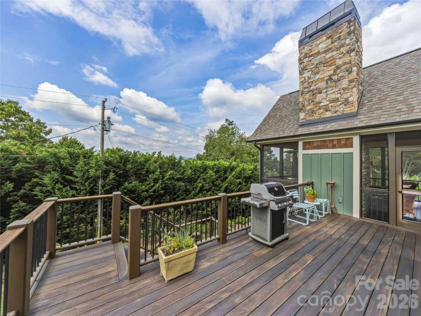 266 Stratford Road, Asheville, NC 28804.  MLS# CAR4400526, YatesRealty ID 36190. Deck has access to back yard and lower level stone patio