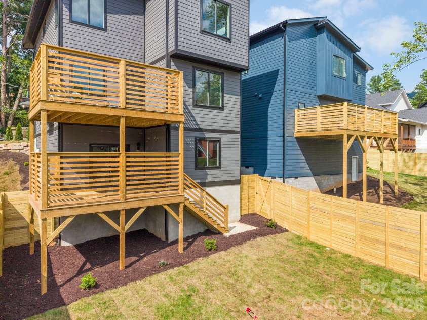 41 Johnson Drive, Asheville, NC 28804.  MLS# CAR4388362, YatesRealty ID 36192. Back exterior and two decks