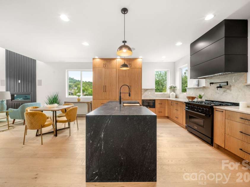 41 Johnson Drive, Asheville, NC 28804.  MLS# CAR4388362, YatesRealty ID 36192. Kitchen + dining area