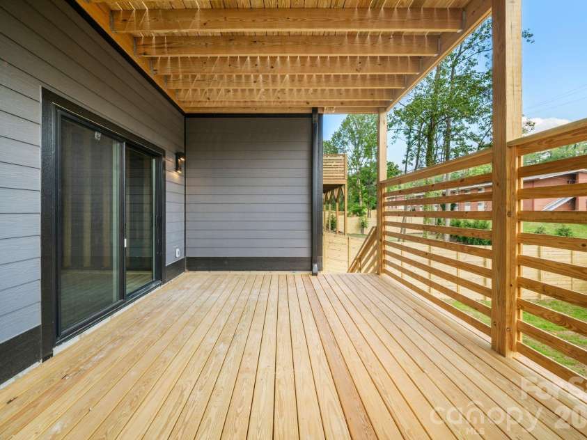 41 Johnson Drive, Asheville, NC 28804.  MLS# CAR4388362, YatesRealty ID 36192. Lower covered deck