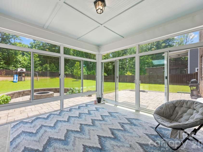 809 Brown Creek Drive, Matthews, NC 28104.  MLS# CAR4399736, YatesRealty ID 36195. Sunroom