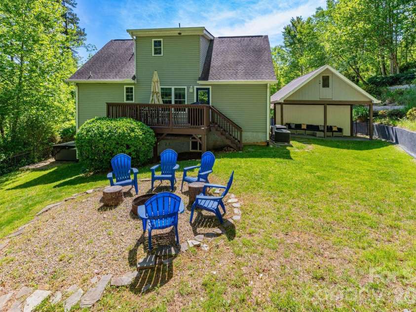 215 Butternut Lane, Leicester, NC 28748.  MLS# CAR4382382, YatesRealty ID 36205. Back Yard Firepit