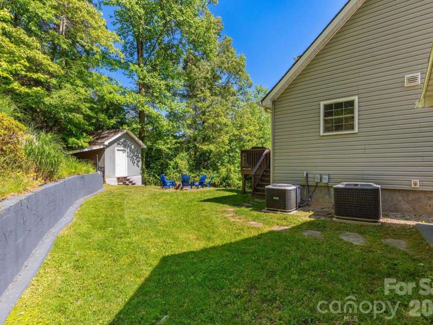 215 Butternut Lane, Leicester, NC 28748.  MLS# CAR4382382, YatesRealty ID 36205. Back Yard with SHed