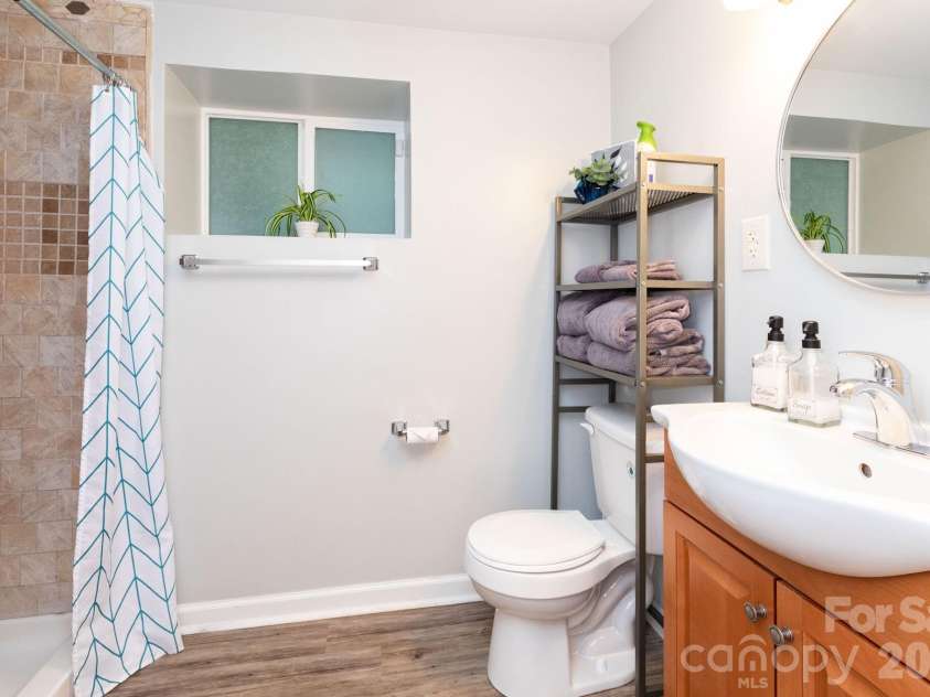 215 Butternut Lane, Leicester, NC 28748.  MLS# CAR4382382, YatesRealty ID 36205. Basement Full Bathroom