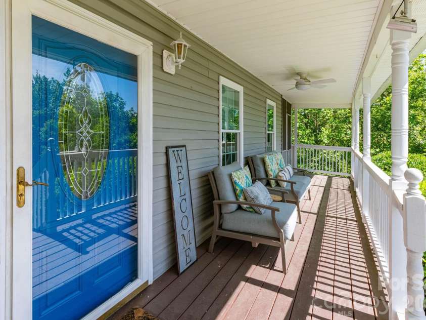 215 Butternut Lane, Leicester, NC 28748.  MLS# CAR4382382, YatesRealty ID 36205. Covered Front Porch