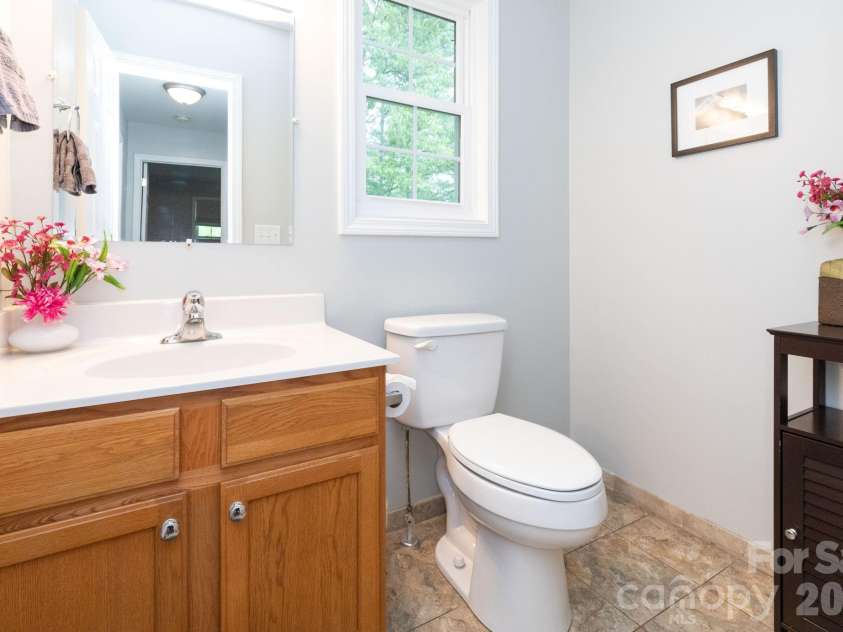 215 Butternut Lane, Leicester, NC 28748.  MLS# CAR4382382, YatesRealty ID 36205. Main Level Half Bath