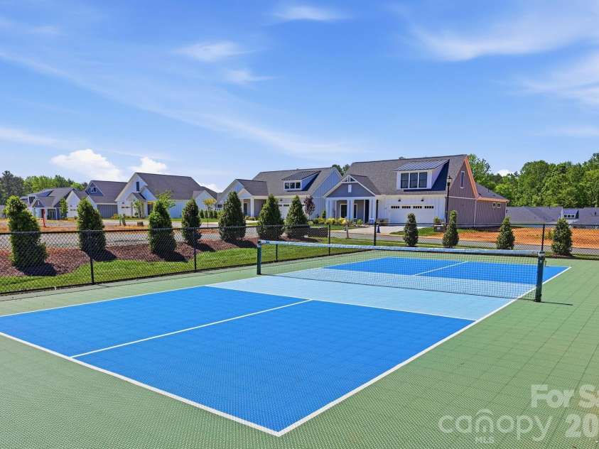 127 Lake Cove Way, Mooresville, NC 28115.  MLS# CAR4389963, YatesRealty ID 36208. The Courtyards at Lake Davidson pickleball court