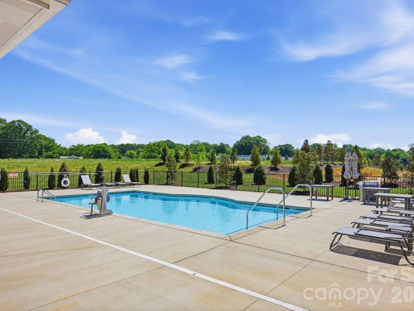 127 Lake Cove Way, Mooresville, NC 28115.  MLS# CAR4389963, YatesRealty ID 36208. The Courtyards at Lake Davidson pool