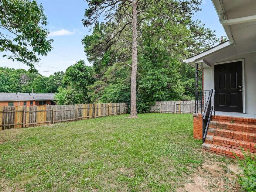 105 Mcgee Street, Fort Mill, SC 29715.  MLS# CAR4393320, YatesRealty ID 36210. Fully fenced-in backyard.