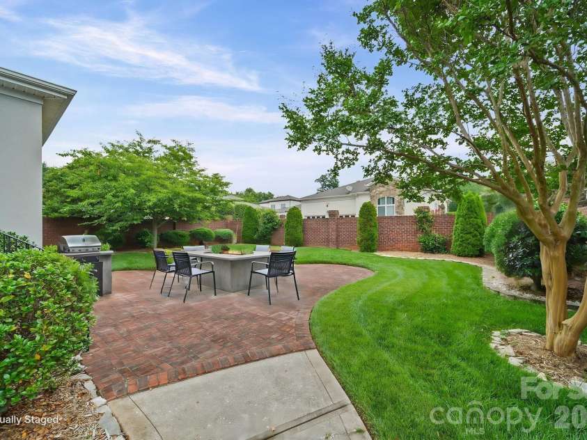 17712 Preston Lake Drive, Cornelius, NC 28031.  MLS# CAR4390824, YatesRealty ID 36211. Back Yard - Digitally Staged