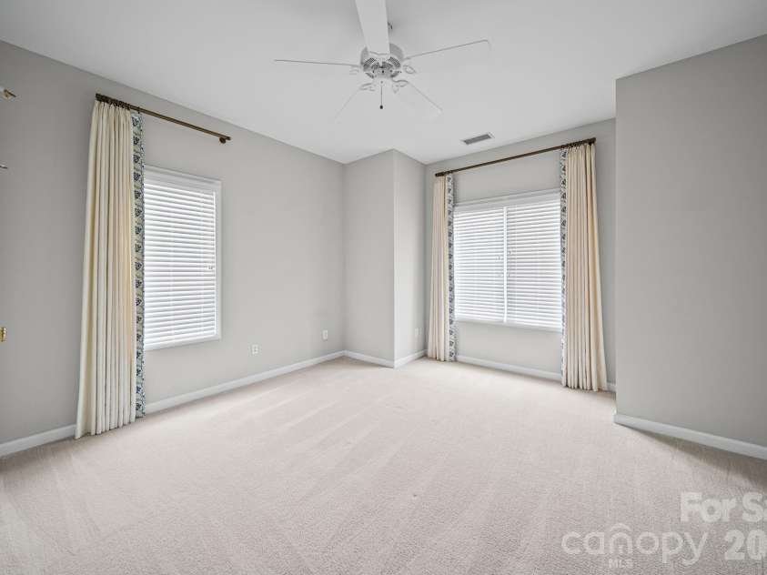 17712 Preston Lake Drive, Cornelius, NC 28031.  MLS# CAR4390824, YatesRealty ID 36211. Upstairs Bedroom - Unstaged