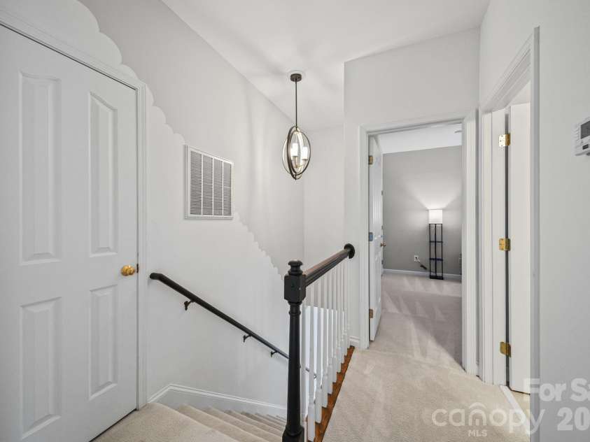 17712 Preston Lake Drive, Cornelius, NC 28031.  MLS# CAR4390824, YatesRealty ID 36211. Upstairs Hallway