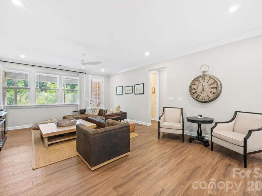 9612 Liberty Hill Drive, Mint Hill, NC 28227.  MLS# CAR4398722, YatesRealty ID 36215. Living room and LVP flooring throughout the entire home including bedrooms