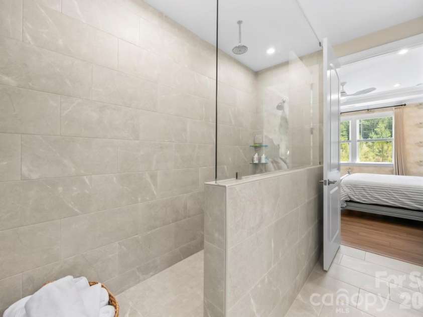 9612 Liberty Hill Drive, Mint Hill, NC 28227.  MLS# CAR4398722, YatesRealty ID 36215. Primary bath with upgraded shower by sellers