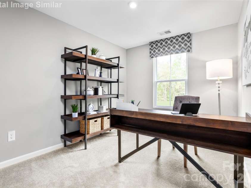 6148 Bridle Creek Drive, Charlotte, NC 28214.  MLS# CAR4401807, YatesRealty ID 36229. Bright, comfortable, and full of potential—this spacious second bedroom with a roomy closet is perfect for guests, work-from-home days, or your personal retreat.