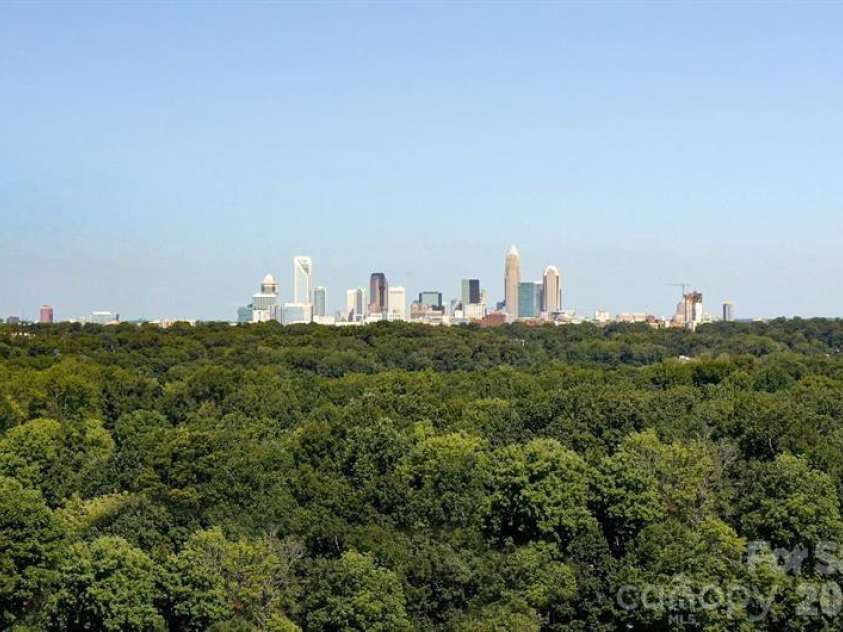 6148 Bridle Creek Drive, Charlotte, NC 28214.  MLS# CAR4401807, YatesRealty ID 36229. Charlotte’s skyline steals the show—where city lights, energy, and Southern charm rise high!