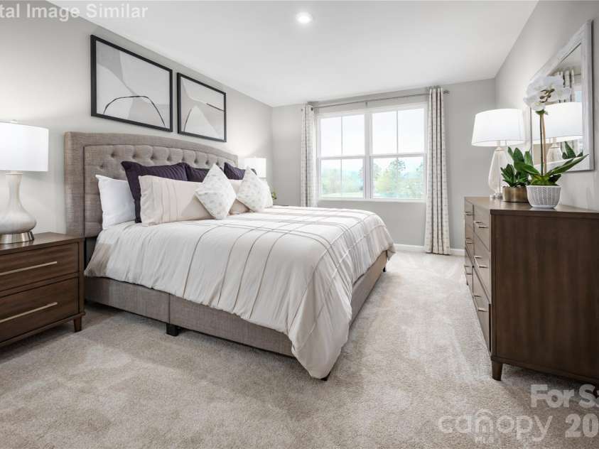 6148 Bridle Creek Drive, Charlotte, NC 28214.  MLS# CAR4401807, YatesRealty ID 36229. Your private escape awaits—this spacious owner’s suite features a luxe bath and an oversized walk-in closet for ultimate comfort and convenience.