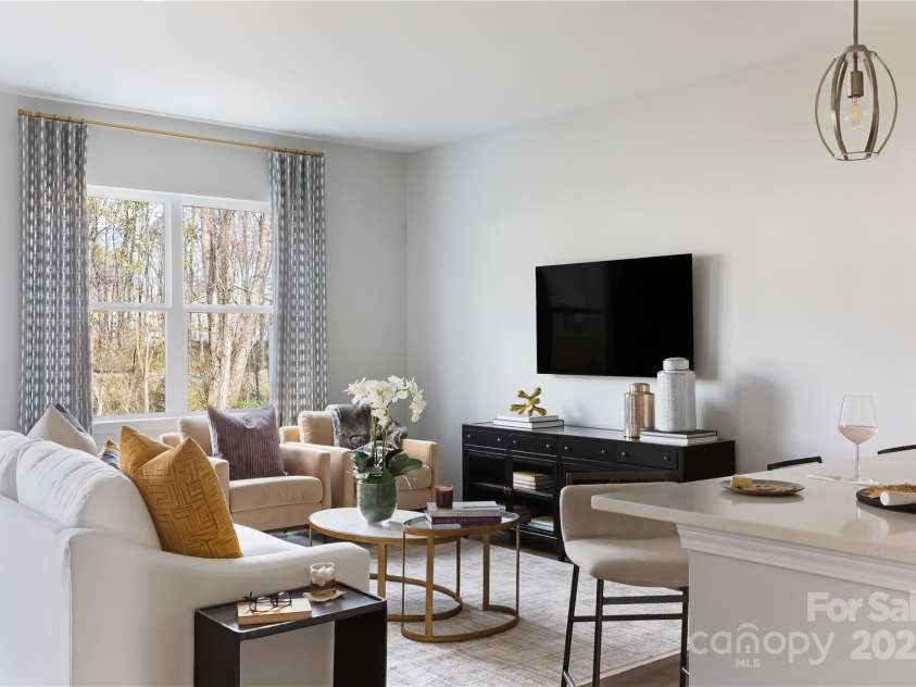 4114 Lattistep Lane, Charlotte, NC 28269.  MLS# CAR4220690, YatesRealty ID 3623. The Conrad Model | Context at Oakhurst *actual finishes, color scheme, orientation vary on this home. Furniture not included