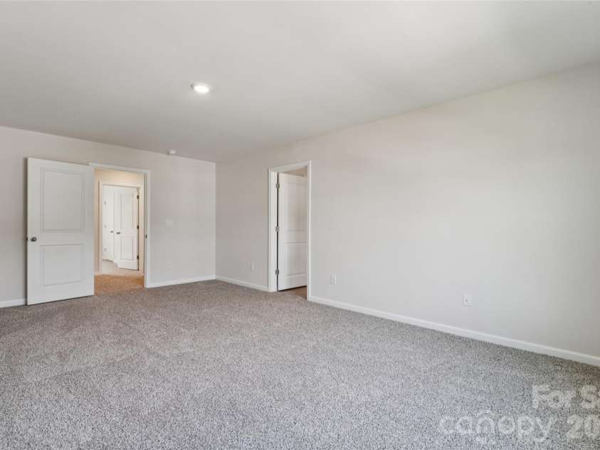132 Scotsway Court, Troutman, NC 28166.  MLS# CAR4401559, YatesRealty ID 36230. Primary bedroom