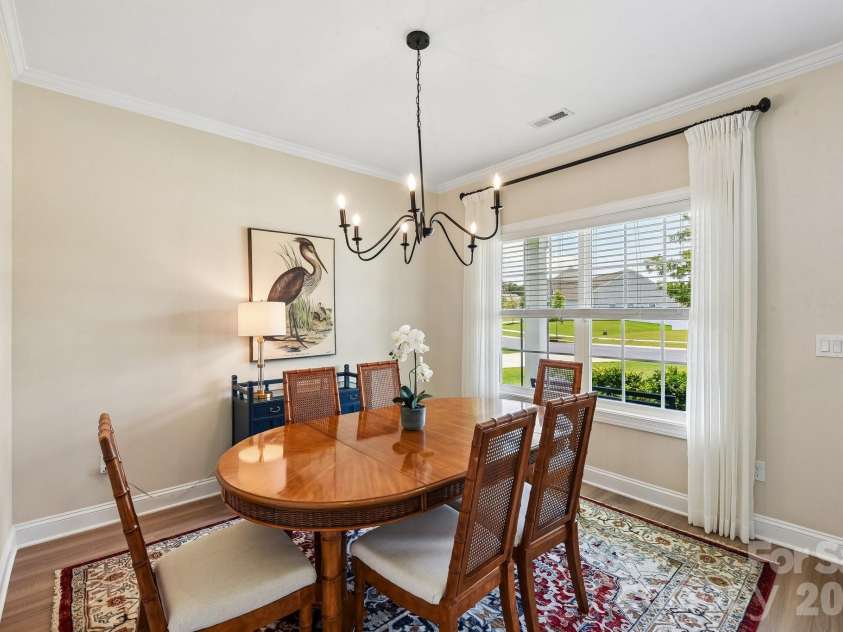 148 Tanner Loop, Troutman, NC 28166.  MLS# CAR4401637, YatesRealty ID 36232. Dining room off foyer