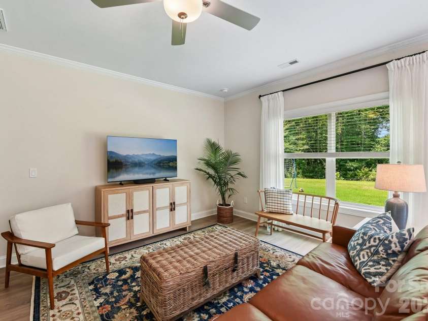 148 Tanner Loop, Troutman, NC 28166.  MLS# CAR4401637, YatesRealty ID 36232. Living room