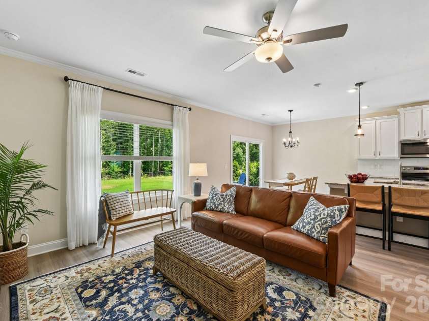 148 Tanner Loop, Troutman, NC 28166.  MLS# CAR4401637, YatesRealty ID 36232. Living room