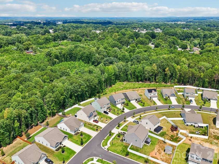 148 Tanner Loop, Troutman, NC 28166.  MLS# CAR4401637, YatesRealty ID 36232. Premium lots back up to wooded area!