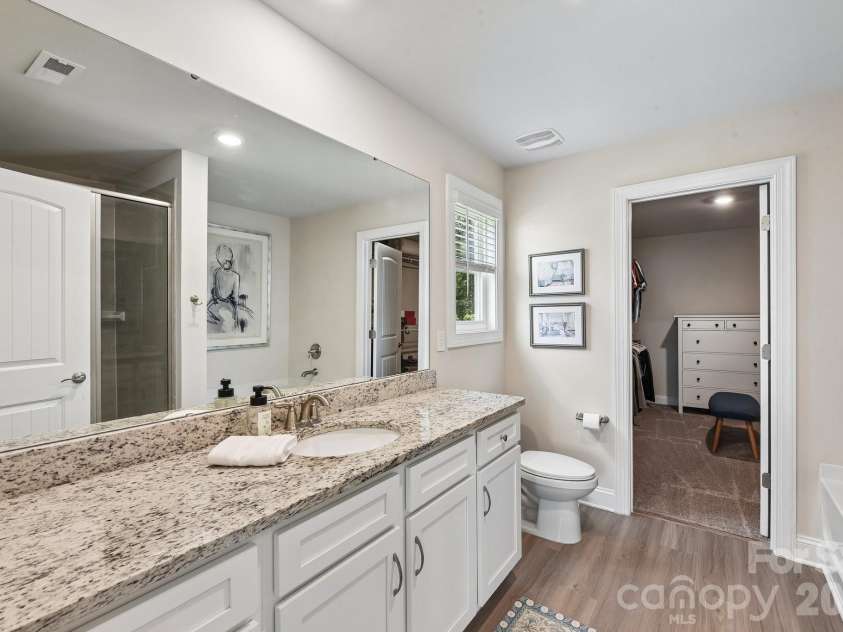 148 Tanner Loop, Troutman, NC 28166.  MLS# CAR4401637, YatesRealty ID 36232. Primary bathroom