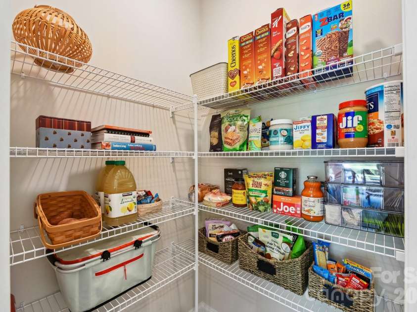 148 Tanner Loop, Troutman, NC 28166.  MLS# CAR4401637, YatesRealty ID 36232. Walk-in pantry!