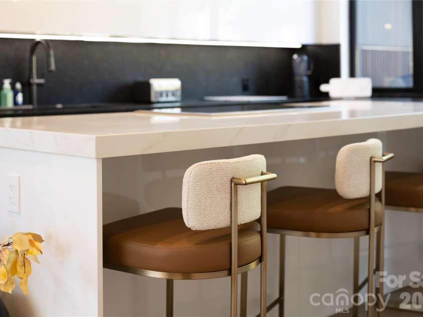 5447 Topping Place, Charlotte, NC 28209.  MLS# CAR4387538, YatesRealty ID 36246. Island seating