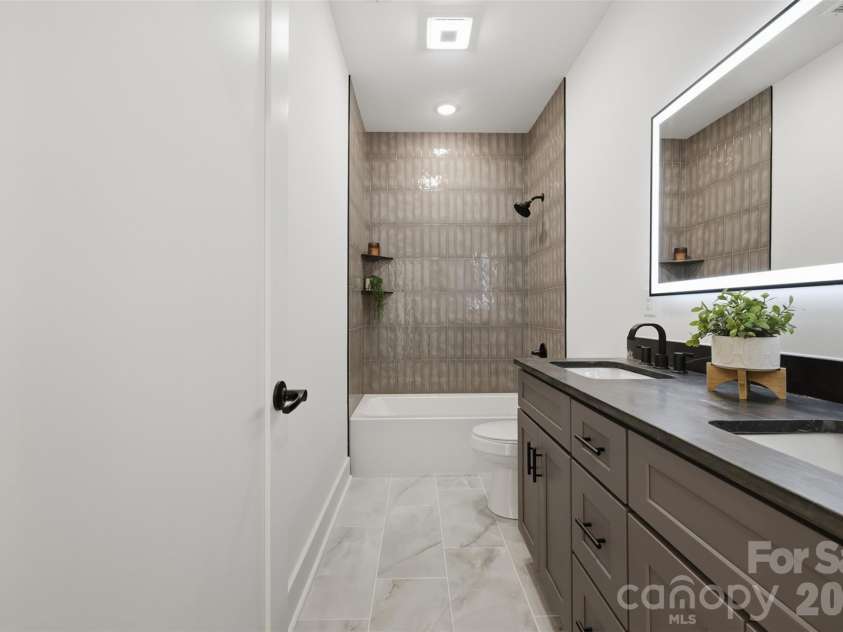 75 2nd Avenue, Taylorsville, NC 28681.  MLS# CAR4394328, YatesRealty ID 36247. Guest bath on 2nd level