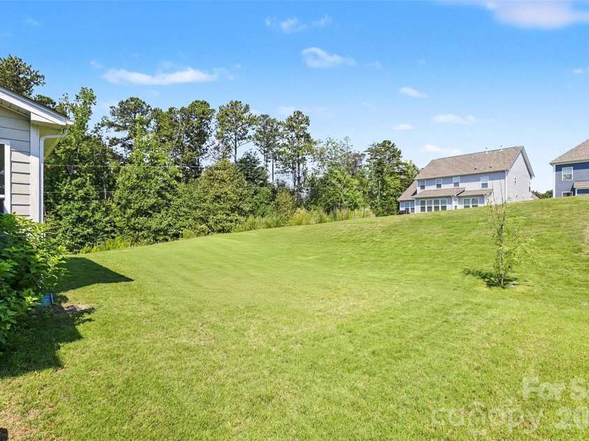 15228 Shallow Ridge Road, Charlotte, NC 28278.  MLS# CAR4393956, YatesRealty ID 36249. Back yard