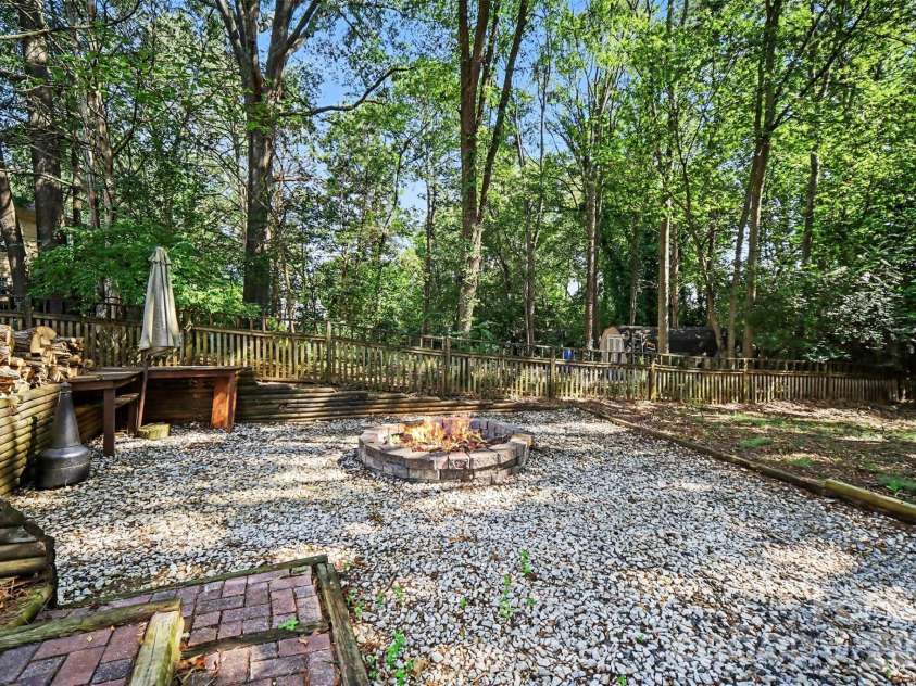 2248 Lawton Bluff Road, Charlotte, NC 28226.  MLS# CAR4418434, YatesRealty ID 36254. Back firepit area