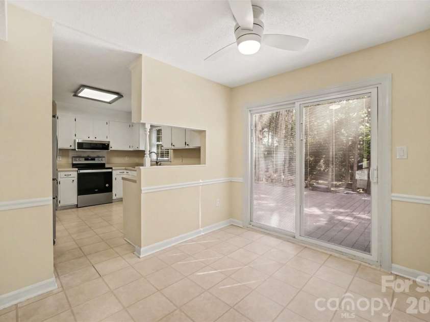 2248 Lawton Bluff Road, Charlotte, NC 28226.  MLS# CAR4418434, YatesRealty ID 36254. Breakfast nook into kitchen
