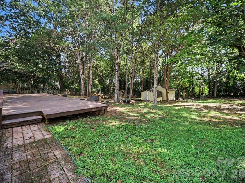 2248 Lawton Bluff Road, Charlotte, NC 28226.  MLS# CAR4418434, YatesRealty ID 36254. Spacious shaded backyard