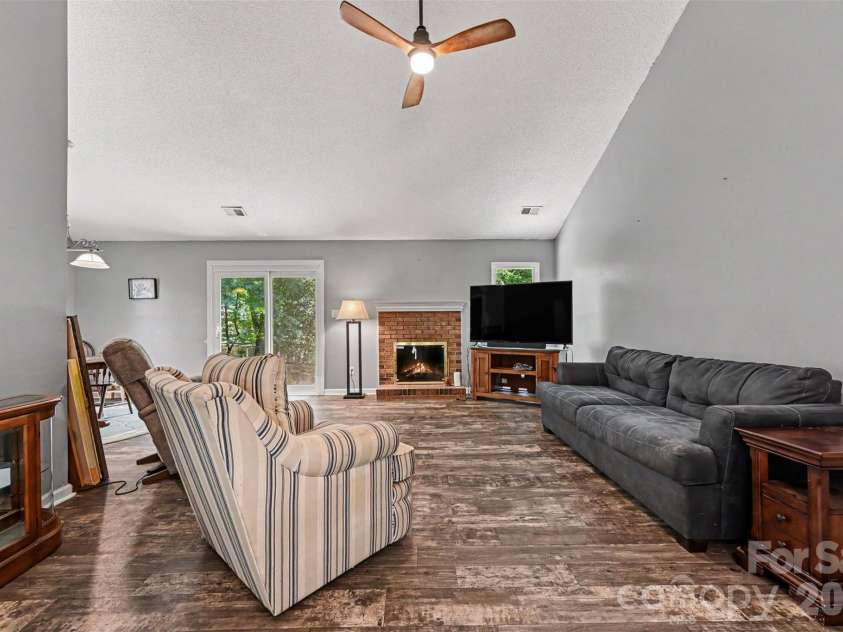 8410 Gidleigh Court, Charlotte, NC 28216.  MLS# CAR4398326, YatesRealty ID 36255. Wood burning fire place