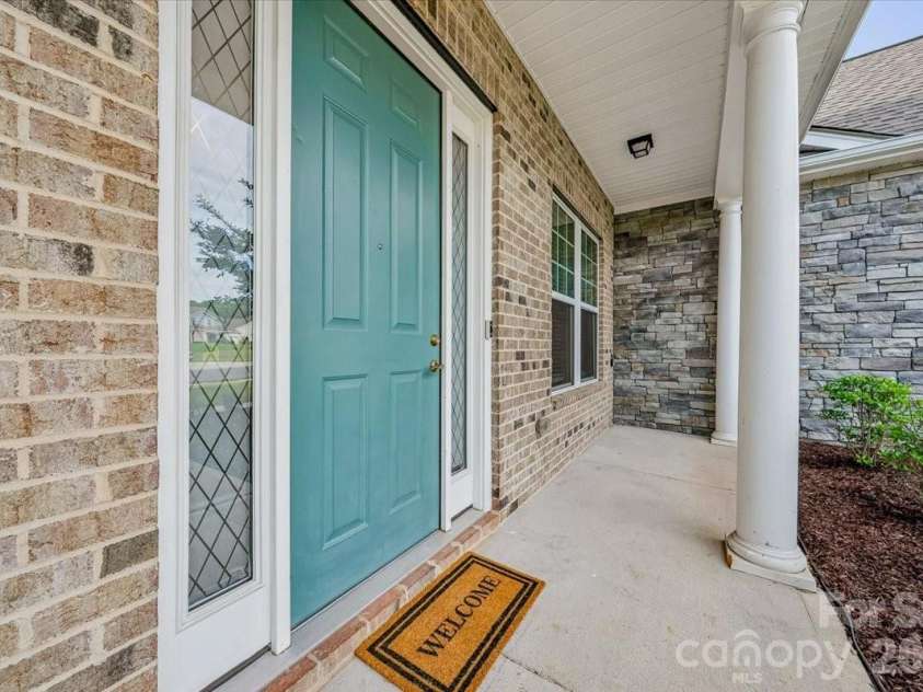 1427 Brooksland Place, Waxhaw, NC 28173.  MLS# CAR4398529, YatesRealty ID 36268. Covered front porch