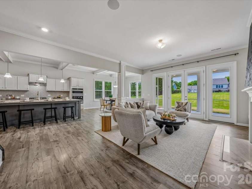 1427 Brooksland Place, Waxhaw, NC 28173.  MLS# CAR4398529, YatesRealty ID 36268. Open floorplan with family room, kitchen, & dining area connected