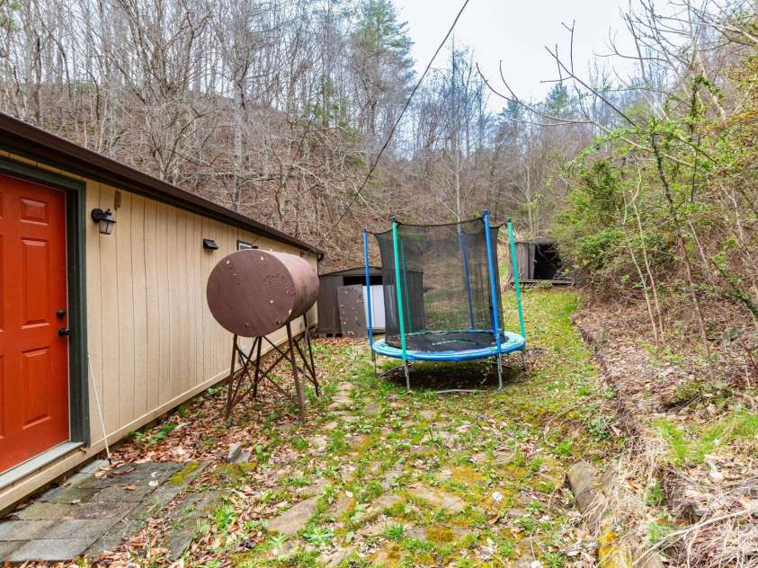 294 Ball Drive, Marshall, NC 28753.  MLS# CAR4360470, YatesRealty ID 36271. Backyard