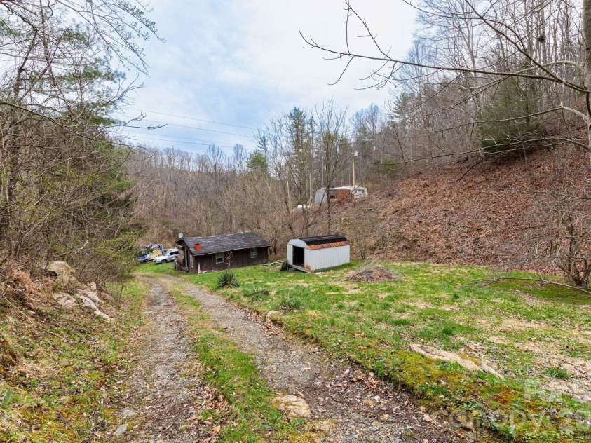 294 Ball Drive, Marshall, NC 28753.  MLS# CAR4360470, YatesRealty ID 36271. Brown building included