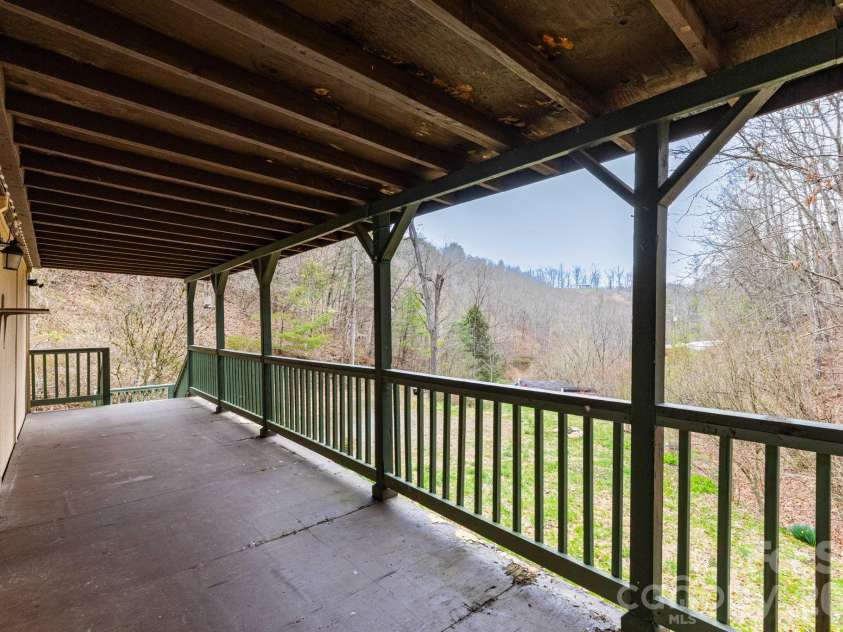 294 Ball Drive, Marshall, NC 28753.  MLS# CAR4360470, YatesRealty ID 36271. Covered front deck