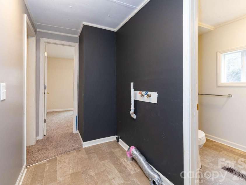 294 Ball Drive, Marshall, NC 28753.  MLS# CAR4360470, YatesRealty ID 36271. Laundry in hallway